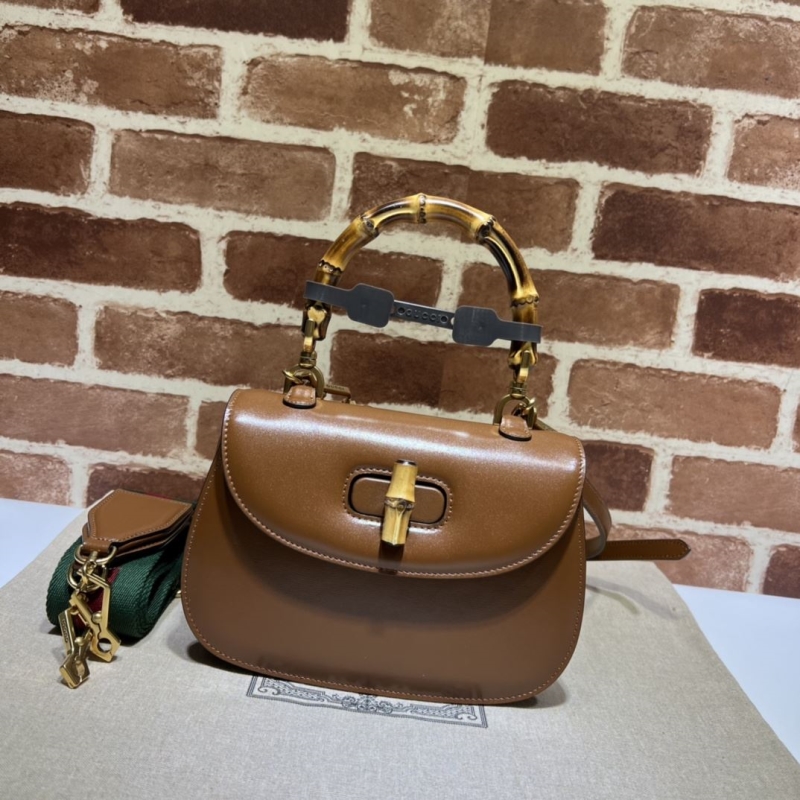 G*u*i top handle bags